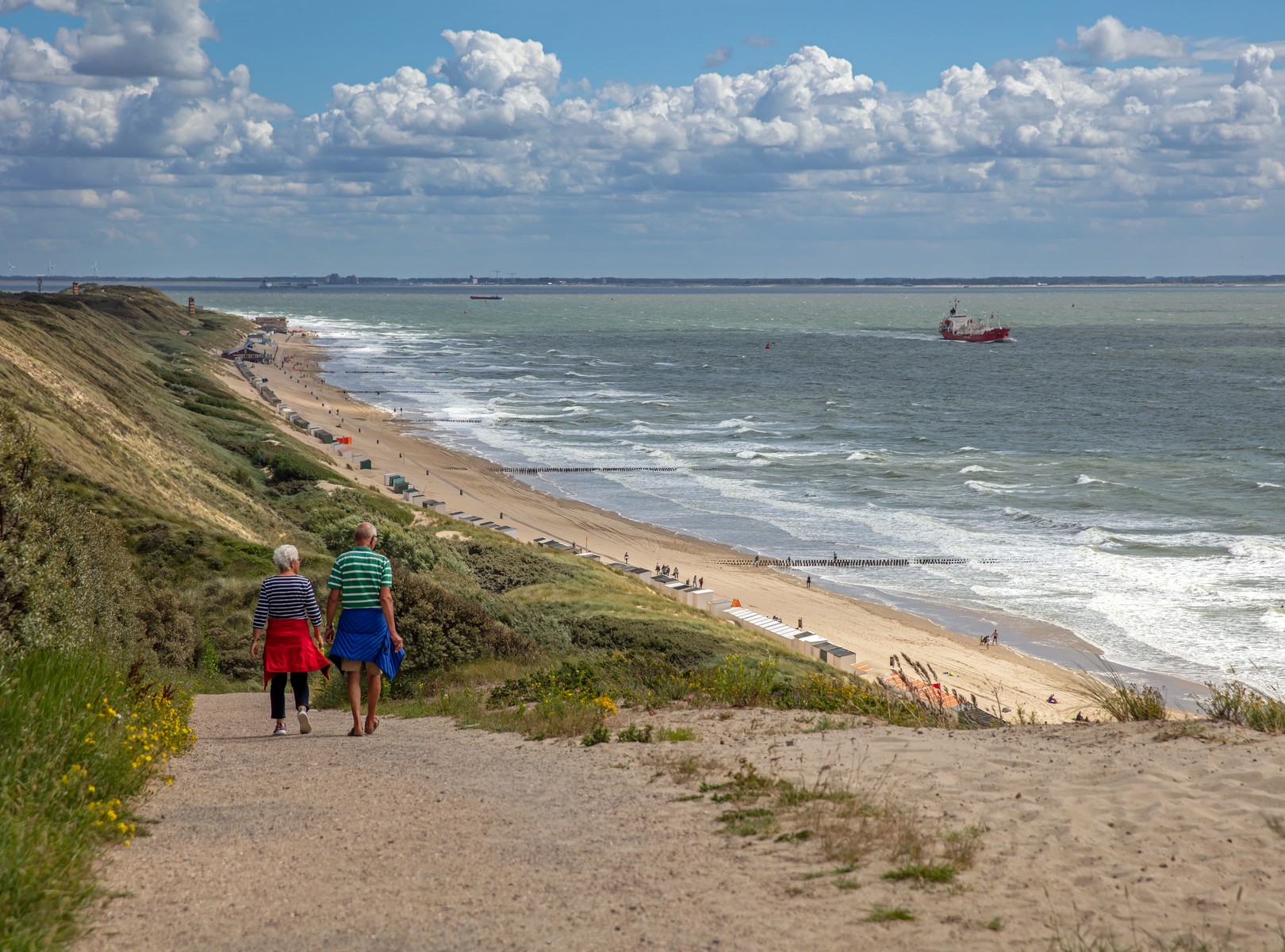 People walking near the beach in Zeeland